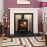Coeval Fires wood-burning stove in a modern living room fireplace.